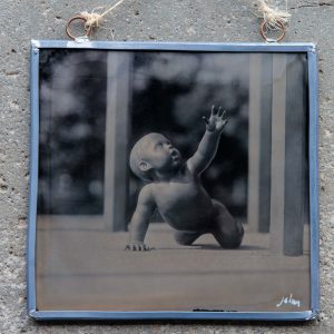 black stained glass Ambrotype of a child sculpture